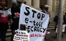 FILE: A members picketing outside the Western Cape High Court against Sanral’s application to keep tolling details secret on 4 August 2014. Picture: Siyabonga Sesant/EWN.