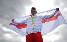 Gold medallist England's Alex Yee poses with his medal during the medal presentation ceremony for the Men's Individual Sprint Distance Triathlon event on day one of the Commonwealth Games at Sutton Park in Sutton Coldfield. Picture: AFP.