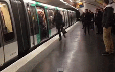Screengrab from a Youtube video of Chelsea fans preventing a man from boarding a Paris Métro train before the Chelsea and Paris Saint-Germain (PSG) Champions League last 16 match on 17 February 2014.