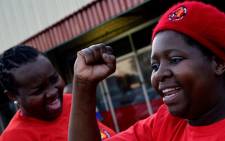 FILE: Striking mine workers who support the National Union of Mineworkers (NUM) in September 2013. Picture: AFP.