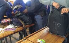 A search and seizure operation during which learners are randomly searched for weapons and drugs was bungled today following a misunderstanding between authorities. Picture: Siyabonga Sesant/EWN.