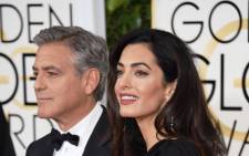 Actor George Clooney and lawyer Amal Alamuddin Clooney attend the 72nd Annual Golden Globe Awards at The Beverly Hilton Hotel on 11 January, 2015. Picture: AFP