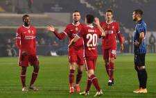 Liverpool players celebrate a goal with Diogo Jota during their UEFA Champions League match against Atalanta on 3 November 2020. Picture: @LFC/Twitter