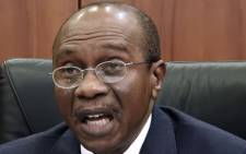FILE: Central Bank of Nigeria (CBN)'s governor Godwin Emefiele gives a press conference on the naira devaluation during a media briefing in Abuja on 15 June 2016. Picture: AFP