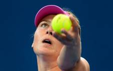 FILE: Maria Sharapova of Russia serves on the way to defeating Kaia Kanepi of Estonia at the Brisbane International tennis tournament in Brisbane in January 2014. Source: AFP.