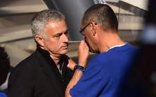 Manchester United's Portuguese manager Jose Mourinho shakes hands with Chelsea's Italian head coach Maurizio Sarri after the English Premier League football match between Chelsea and Manchester United at Stamford Bridge in London on 20 October, 2018. Picture: AFP.