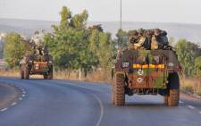 A landmine near the Algeria border has killed one Tunisian soldier and wounded seven. Picture: AFP