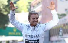 Mercedes Formula 1 driver Nico Rosberg celebrates after winning the Monaco Grand Prix on 26 May 2013. Picture: AFP.