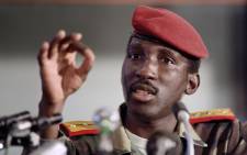 (FILES) In this file photo taken on September 2, 1986, Captain Thomas Sankara, President of Burkina Faso gives a press conference during a non-aligned summit in Harare. The trial of 14 men, including a former president, was set to begin in Burkina Faso on October 11, 2021, over the assassination of the country's revered revolutionary leader Thomas Sankara 34 years ago. Picture: Dominique Faget / AFP.
