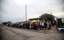 People queue to cast their votes at the Emfundisweni Pre-Primary School in Nomzamo, in the Western Cape. Picture: Cindy Archillies/EWN.