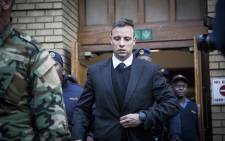 Convicted murderer Oscar Pistorius leaves the High Court in Pretoria after the conclusion of sentencing arguments in his murder trial. Picture: Reinart Toerien/EWN.
