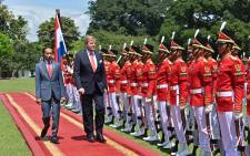 Dutch King Willem-Alexander, accompanied by Indonesian President Joko Widodo, inspects a guard of honour at the Bogor presidential palace in Bogor on 10  March 2020. Picture: AFP.
