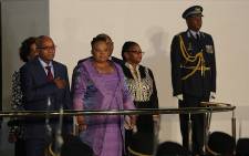 President Jacob Zuma and his wife Nompumelelo Ntuli stand for the national anthem and the 21 gun salute.