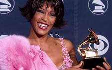 FILE: US singer Whitney Houston holding her Grammy award for Best Female Rythm and Blues Vocal Performance in 2000. Picture: AFP