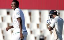 South African bowler Lungi Ngidi (L) celebrates the dismissal of Indian batsman Lokesh Rahul (R) during the fourth day of the second Test cricket match between South Africa and India at Supersport cricket ground on 16 January 2018 in Centurion. Picture: AFP.