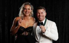 Ellyse Perry (left) and David Warner (right) with their respective Australian cricket honours. Picture: @CricketAus/Twitter