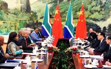 President Jacob Zuma with members of his delegation during a bilateral meeting with China Premier Li Keqiang at the Great Hall of the People in the People's Republic of China. Picture: GCIS.