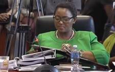 A screengrab of Social Development Minister Bathabile Dlamini answering questions at the inquiry into her role in the social grants debacle.