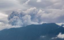 Volcanic ash spews from Mount Marapi during an eruption as seen from Tanah Datar in West Sumatra on 3 December 2023. Picture: AFP