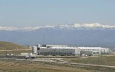 Security fences surround the National Security Agency's (NSA) Utah data collection center in Bluffdale, Utah near Salt Lake City on April 12, 2017. The 1.5 billion USD data center, thought to be the largest in the world, with a reported size to be on the order of an exabytes or larger, supports the Comprehensive National Cybersecurity Initiative (CNIC) of the United States Government. Picture: AFP.