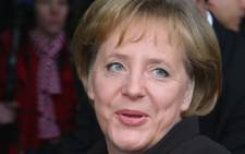 Angela Merkel was re-elected as leader of the conservative Christian Democrats ahead of 2013 elections.