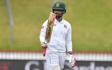 FILE: Bangladesh's Tamim Iqbal Khan celebrates 50 runs during day three of the 2nd Test cricket match between New Zealand and Bangladesh at the Basin Reserve in Wellington on 10 March 2019. Picture: AFP