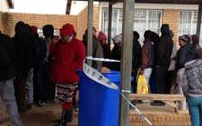 Joe Slovo residents are pictured in a queue before voting on 3 August 2016. Picture: Rahima Essop/EWN.