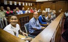 FILE: An alleged leader of the 28s gang, George Thomas, and his 17 co-accused in court on 4 May 2015, they collectively face 166 charges ranging from murder to attempted murder. Picture: Thomas Holder/EWN.