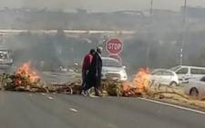 Burning tyres could be seen on Allandale Road in Midrand. Picture: @GTP_Traffstats/twitter.