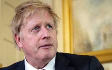 FILE: A handout image released by 10 Downing Street, shows Britain's Prime Minister Boris Johnson as he delivers a television address after returning to 10 Downing Street after being discharged from St Thomas' Hospital, in central London on 12 April 2020. Picture: AFP.