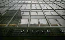 Pfizer's corporate headquarters stand in midtown Manhattan on a morning where volunteers with Doctors Without Borders dumped $17 million in fake money outside of the building to protest high vaccine prices on November 12, 2015 in New York City. Picture: AFP