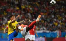Brazil's forward Philippe Coutinho (L) and Switzerland's forward Breel Embolo compete for the ball during the Russia 2018 World Cup Group E football match between Brazil and Switzerland at the Rostov Arena in Rostov-On-Don on 17 June 2018. Picture: AFP