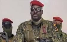 A screengrab taken from footage sent to AFP by a military source on 5 September 2021 shows Guinean Colonel Doumbouya delivering a speech following the capture of the President of Guinea Conakry and the dissolution of the government during a coup d'etat in Conakry on 5 September 2021. Picture: AFP
