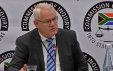 A screengrab of former KZN Hawks head Johan Booysen gives testimony at the Zondo commission of inquiry into state capture on 17 April 2019.