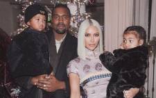 FILE: Kanye West (left) and Kim Kardashian with their two children. Picture: @KimKardashian/Twitter.
