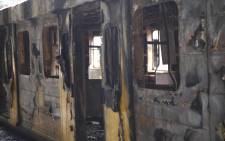Eight train carriages have been destroyed at Cape Town Train Station. Picture: Cindy Archillies/EWN