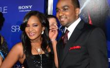 FILE: Bobbi Kristina (L) and her date at the world premiere of 'Sparkle' in Hollywood, in August, 2012. Picture: AFP
