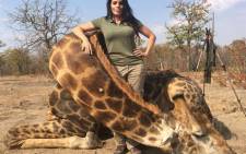 Sabrina Corgatelli poses with a giraffe that she apparently shot on a safari in SA. Picture: Facebook