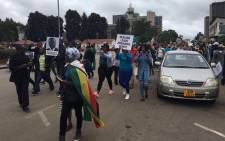 Hundreds of Zimbabweans have taken to the streets in a peaceful march calling for the axing of president of president Robert Mugabe on 18 November 2018. Picture: EWN.