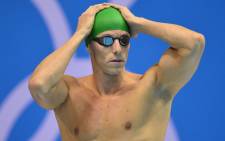 FILE: South Africa's Roland Schoeman prepares to compete in the men's 50m freestyle semifinals swimming event at the London 2012 Olympic Games on 2 August 2012 in London. Picture: Fabrice Coffrini/AFP