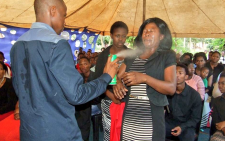 FILE: Lethabo Rabalago sprays insecticide on a follower. Picture: Facebook.