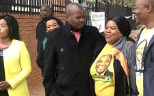 United Democratic Movement leader Bantu Holomisa talks to African National Congress supporters as he enters Arcadia Primary School to cast his vote on 8 May 2019. Picture: Barry Bateman/EWN