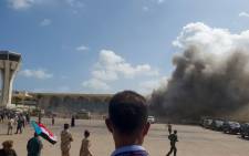 Smoke billows at the Aden Airport on 30 December 2020, after explosions rocked the Yemeni airport shortly after the arrival of a plane carrying members of a new unity government. Picture: AFP