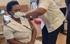 Nurse Zoliswa Gidi-Dyosi was the first South African and health care worker to receive the Johnson & Johnson COVID-19 vaccine on 17 February 2021 at Khayelitsha Hospital. Picture: Twitter/@DrZweliMkhize
