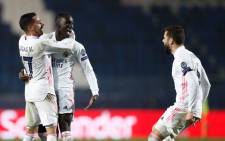 Real Madrid's Ferland Mendy celebrates his goal against Atalanta with teammates during their Uefa Champions League match on 24 February 2021. Picture: @realmadriden/Twitter