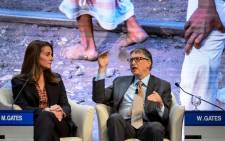 FILE. Melinda and Bill Gates attend a session at the Congress Center during the World Economic Forum (WEF) annual meeting on 23 January, 2015. Picture: AFP.