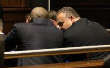 Czech fugitive Radovan Krejcir and co-accused Desai  Luphondo at the Palm Ridge Regional Court during their bail hearing on 4 December 2013. Picture: Christa van der Walt/EWN.