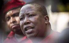 EFF leader Julius Malema addressed the media outside the Constitutional Court in Johannesburg on 09 February 2016 following the Nkandla showdown. Picture: Reinart Toerien/EWN.