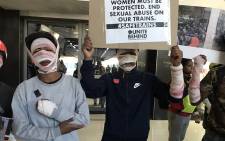 Activists and commuters came to the protest at the Cape Town train station in bandages and fake blood to symbolise the lives lost while using public transport. Picture: Lizell Persens/EWN