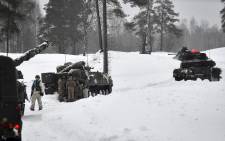 British and Estonian soldiers take part in a major drill as part of the EFP NATO operation at the Tapa Estonian army camp near Rakvere, on February 6, 2022. The "Winter Camp" exercise in northeast Estonia, just 100 kilometres (62 miles) from the Russian border, included some 1,300 British, Estonian and French troops operating in extreme conditions. Picture: ALAIN JOCARD / AFP